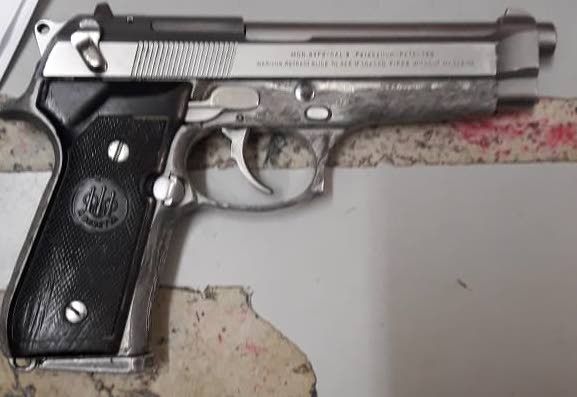 Two Arrested Police Seize Gun And Ammunition Trinidad Guardian