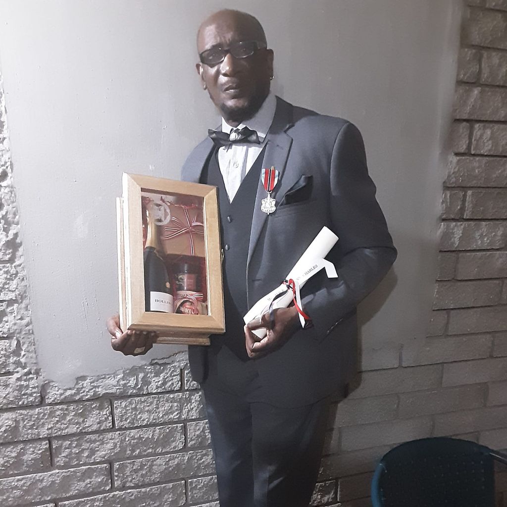 retired-cop-receives-national-award-trinidad-guardian