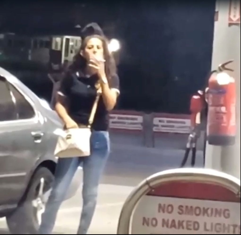 Cops identify woman filmed smoking in gas station - Trinidad Guardian