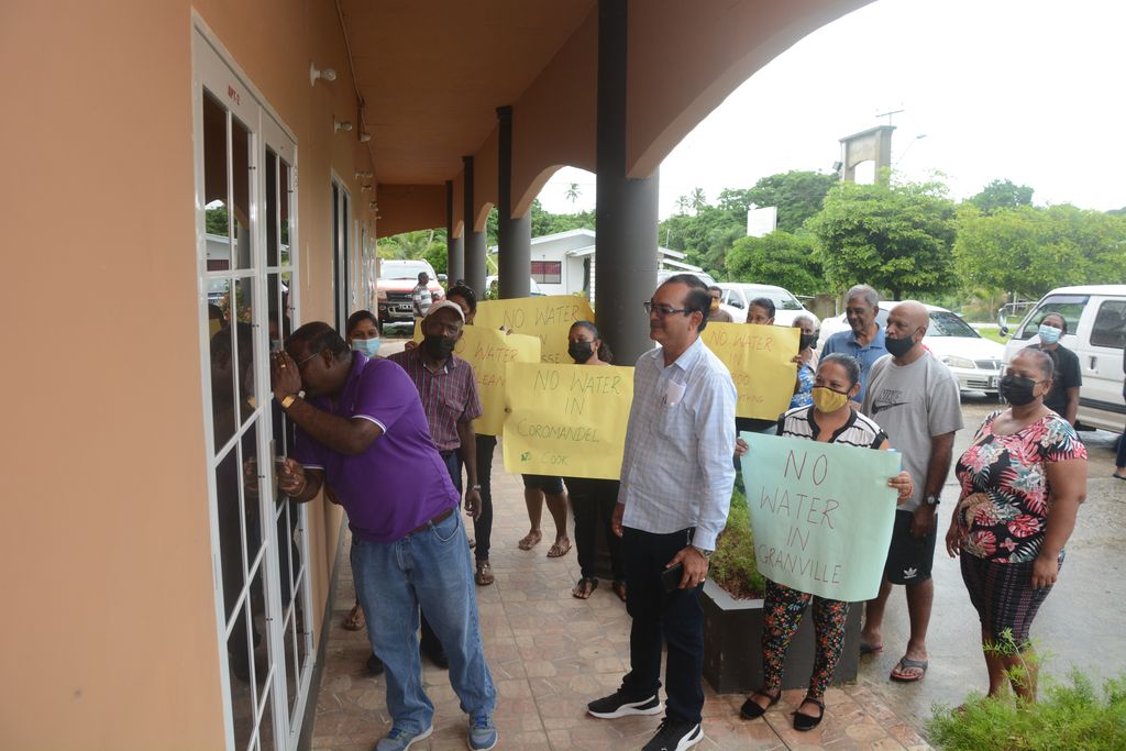 cedros-residents-take-water-protest-to-mp-s-office-trinidad-guardian