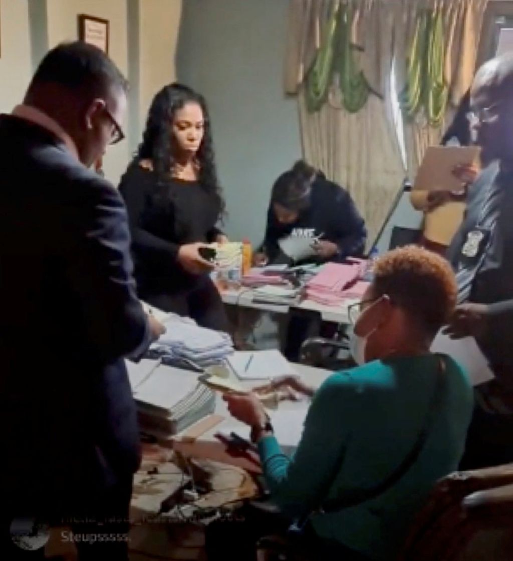 An screenshot of an Instagram feed from DSS owner Kerron Clarke showing officers going through documents at his La Horquetta operation yesterday. 
