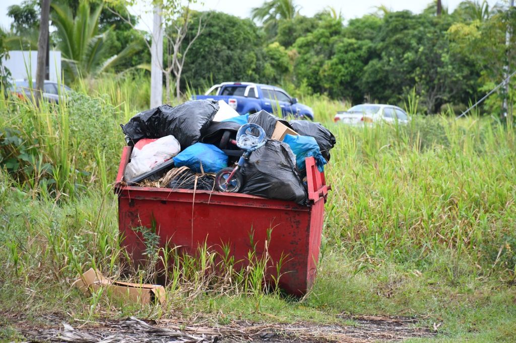 Abandoned dumpster outside vaccine site creates woes - Trinidad Guardian