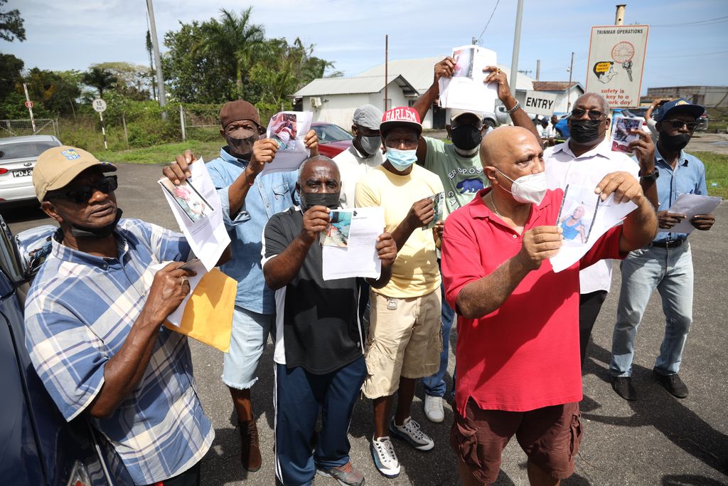 Ex-Trinmar workers protest over scrapped medical plan - Trinidad Guardian