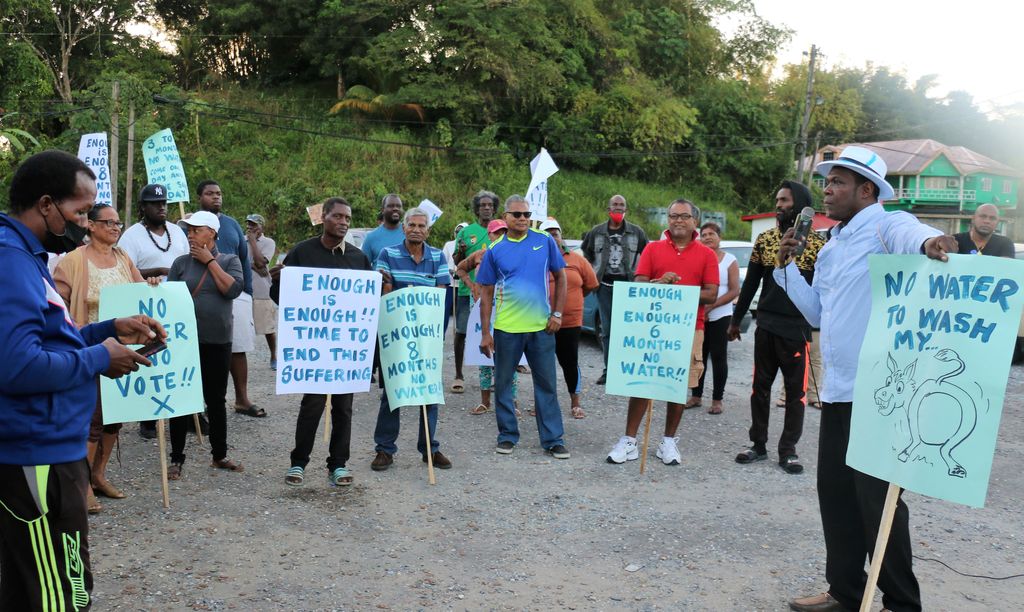 Manzan residents happy as water restored to community - Trinidad Guardian