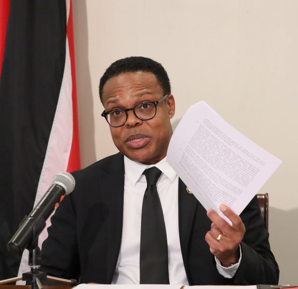 Foreign and Caricom Affairs Minister Dr Amery Browne holds the Joint Declaration of Argyle for Dialogue and Peace between Guyana and Venezuela at his ministry in St Clair  yesterday.
