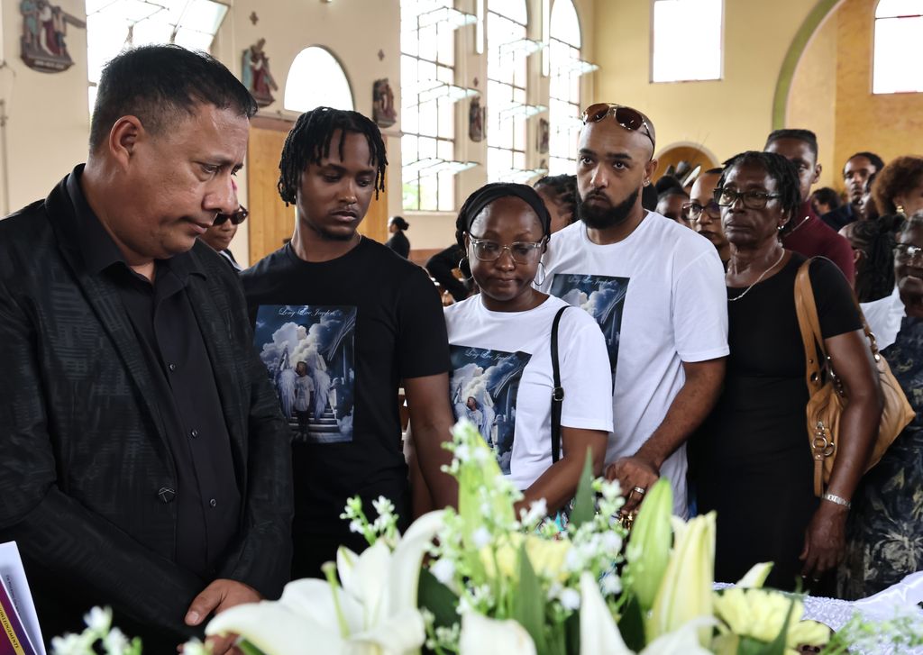 Mass shooting victim laid to rest - Trinidad Guardian