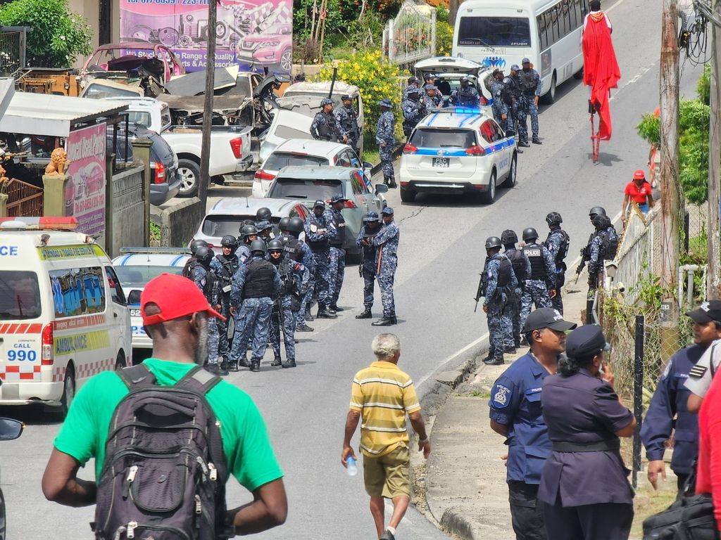 Scores of police officers gather at Avocat Junction, Fyzabad, before the start of the annual Labour Day march in 2024.