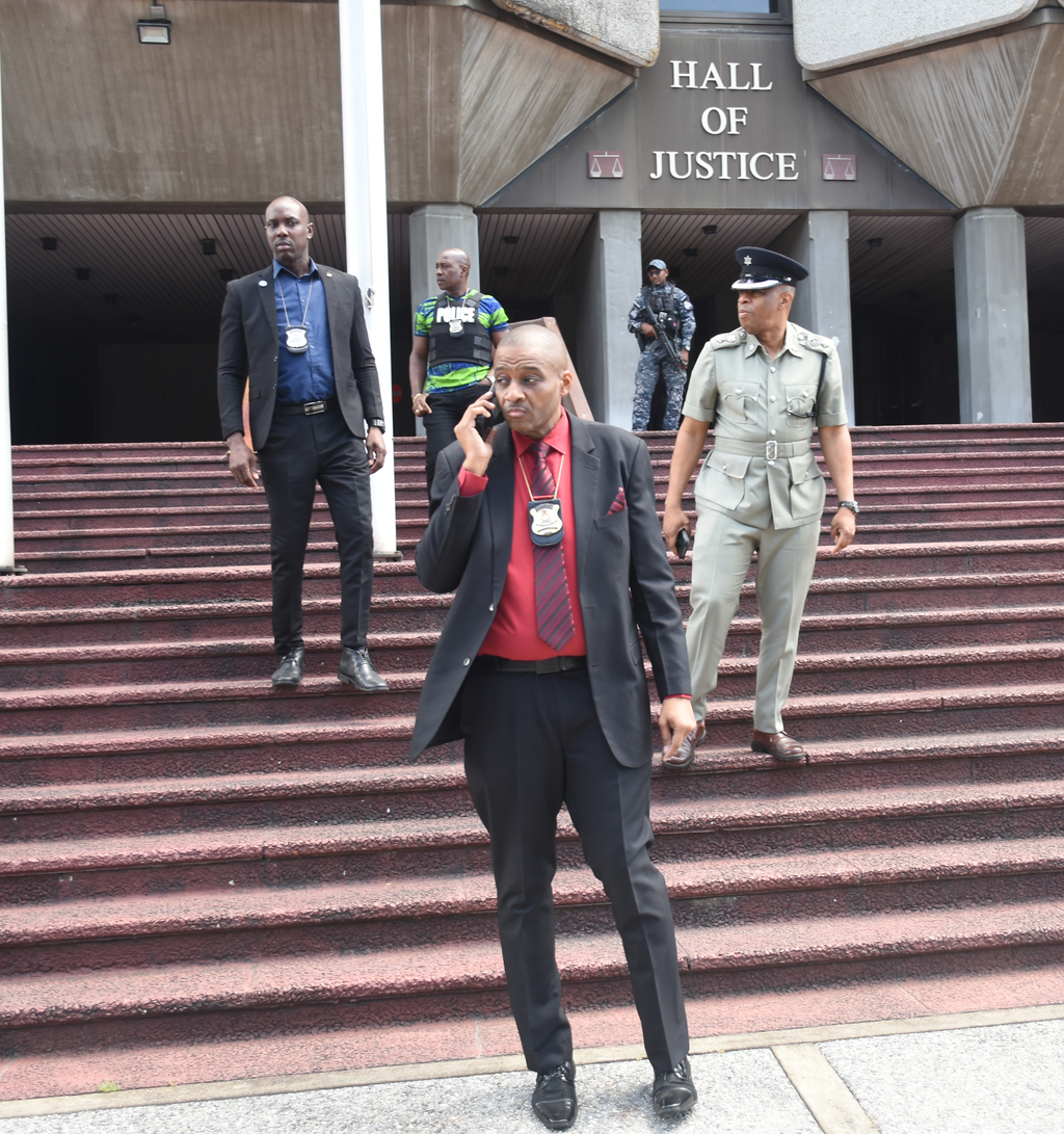 Commissioner of Police Allister Guevarro leaves the Hall of Justice after his meeting with judicial officers yesterday.