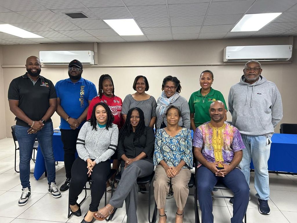 The Executive of the National Parang Association 2025-27. Back row, from left: Kervin Preudhomme, assistant secretary; Shaquille Headley, committee member; Cheriese Pierre, committee member; Lisa Lee, trustee; Joanne Briggs, PRO; Yarelis Touissant, committee member; William Calliste, trustee. Front row, from left: Jenais Carter, secretary; Alicia Jaggasar, president; Henrietta Carter, vice president; Joseph Bertrand, youth officer. Missing: Kerrylee Chee Chow, treasurer; Chevone Pierre, committee member.