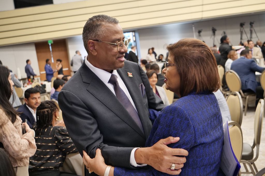 Minister of Planning, Economic Affairs and Development Dr Kennedy Swaratsingh greets former energy minister Carolyn Seepersad-Bachan during the T&T Chamber of Industry and Commerce Business Outlook 2025 at the Hyatt Regency yesterday.