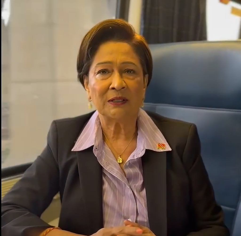 FILE - Prime Minister Kamla Persad-Bissessar speaks during an interview conducted during her train journey from New York to a meeting with U.S. Secretary of State Marco Rubio in Washington DC, on September 28, 2025. [Image courtesy UNC]