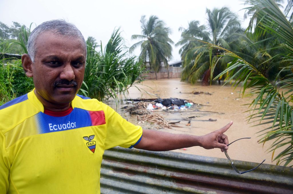 Caroni River overflows into village - Trinidad Guardian